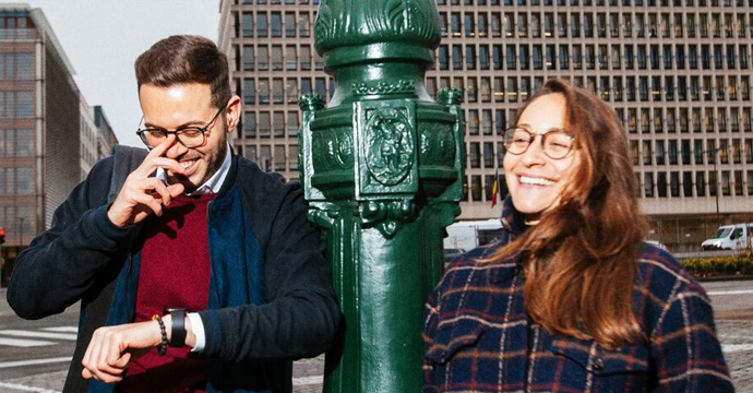 Two young people smiling